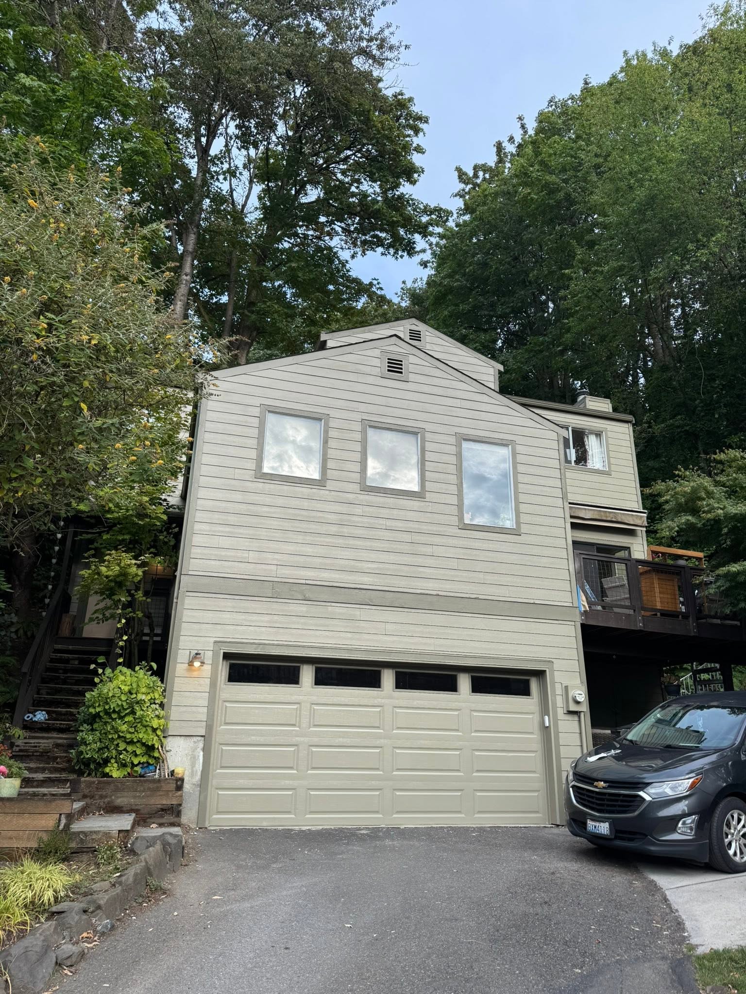 King County home with new lap siding, windows, and garage after exterior work